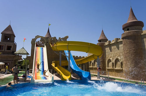 Водные горки в бассейне отеля Belek Beach Resort Hotel 5* (Белек Бич Резорт Отель 5*) Фото отеля Belek Beach Resort Hotel 5* (Белек Бич Резорт Отель 5*)