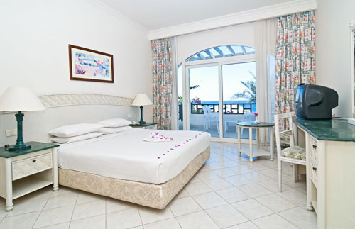 Номер отеля Poinciana Sharm Resort 4* (Пойнсиана Шарм Резорт 4*) Фото отеля Poinciana Sharm Resort 4* (Пойнсиана Шарм Резорт 4*)