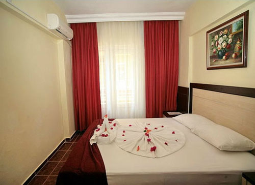 Номер отеля Blue Wave Suite Hotel 4* (Блю Вейв Сьют Отель 4*) Фото отеля Blue Wave Suite Hotel 4* (Блю Вейв Сьют Отель 4*)