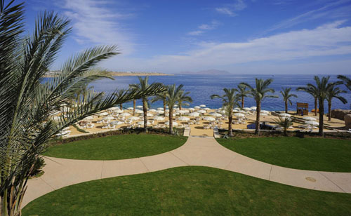 Пляж отеля Stella Di Mare Beach Hotel & Spa 5* (Стелла Ди Маре Бич Отель энд Спа 5*) Фото отеля Stella Di Mare Beach Hotel & Spa 5* (Стелла Ди Маре Бич Отель энд Спа 5*)