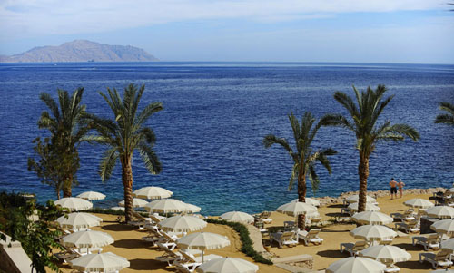 Пляж отеля Stella Di Mare Beach Hotel & Spa 5* (Стелла Ди Маре Бич Отель энд Спа 5*) Фото отеля Stella Di Mare Beach Hotel & Spa 5* (Стелла Ди Маре Бич Отель энд Спа 5*)