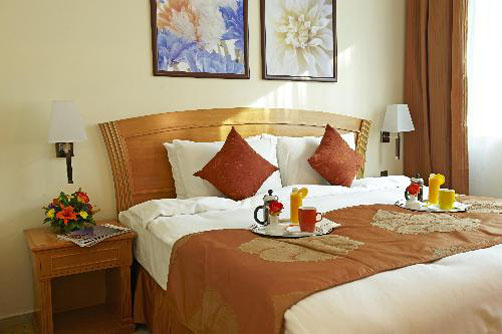Номер отеля Golden Tulip Sharjah Hotel Apartments 4* (Голден Тулип Шарджа Отель Апартментс 4*) Фото отеля Golden Tulip Sharjah Hotel Apartments 4* (Голден Тулип Шарджа Отель Апартментс 4*)