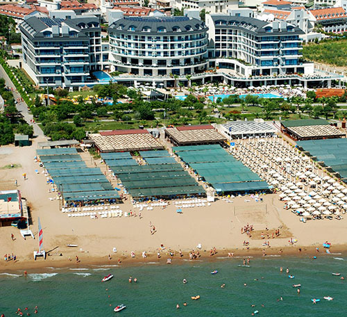 Пляж отеля Commodore Elite Suites Spa 5* (Коммодоре Элит Сьютс Спа 5*) Фото отеля Commodore Elite Suites Spa 5* (Коммодоре Элит Сьютс Спа 5*)
