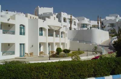 Корпус отеля Dessole Royal Rojana Resort 5* (Дессоль Роял Роджана Резорт 5*) – Шарм-Эль-Шейх - Египет Фото отеля Dessole Royal Rojana Resort 5* (Дессоль Роял Роджана Резорт 5*) – Шарм-Эль-Шейх - Египет