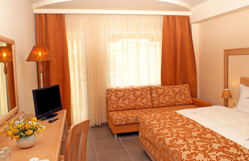 Номер отеля Alexandros Palace Hotel & Suites 5* (Александрос Палас Отель энд Сьютс 5*) Фото отеля Alexandros Palace Hotel & Suites 5* (Александрос Палас Отель энд Сьютс 5*)