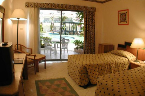 Номер отеля Al Bostan Hotel 4* (Аль Бостан Отель 4*) Фото отеля Al Bostan Hotel 4* (Аль Бостан Отель 4*)