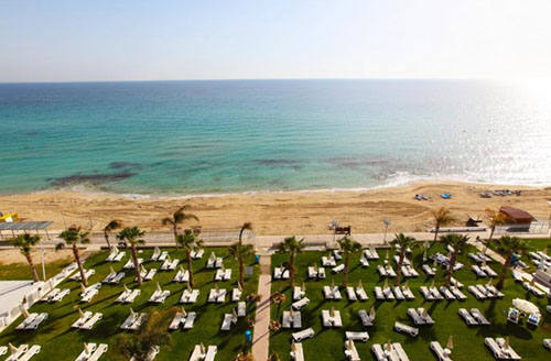 Пляж отеля Constantinos the Great Beach Hotel 5* (Константинос зе Грейт Бич Отель 5*) Фото отеля Constantinos the Great Beach Hotel 5* (Константинос зе Грейт Бич Отель 5*)