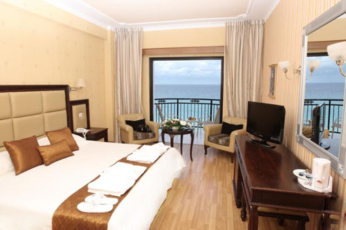 Номер отеля Constantinos the Great Beach Hotel 5* (Константинос зе Грейт Бич Отель 5*) Фото отеля Constantinos the Great Beach Hotel 5* (Константинос зе Грейт Бич Отель 5*)