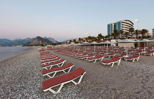Пляж отеля Porto Bello Hotel Resort & Spa 5* (Порто Белло Отель Резорт энд Спа 5*) Фото отеля Porto Bello Hotel Resort & Spa 5* (Порто Белло Отель Резорт энд Спа 5*)