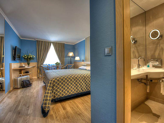 Номер Deluxe Room отеля Austria Trend Hotel Ananas 4* (Австрия Тренд Отель Ананас 4*) Фото отеля Austria Trend Hotel Ananas 4* (Австрия Тренд Отель Ананас 4*)