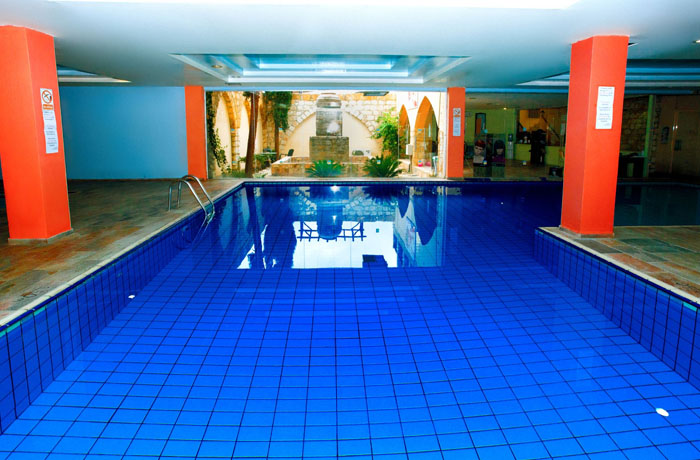 Крытый бассейн отеля Akteon Holiday Village 4* (Актеон Холидей Виладж 4*) Фото отеля Akteon Holiday Village 4* (Актеон Холидей Виладж 4*)