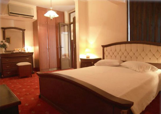 Номер отеля Alexandros Hotel 4* (Александрос Отель 4*) Фото отеля Alexandros Hotel 4* (Александрос Отель 4*)