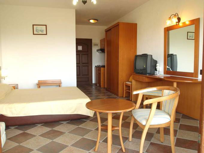 Номер Superior Room (Studio) отеля Aristoteles Holiday Resort & Spa 4* (Аристотель Холидей Ресорт энд Спа 4*) Фото отеля Aristoteles Holiday Resort & Spa 4* (Аристотель Холидей Ресорт энд Спа 4*)